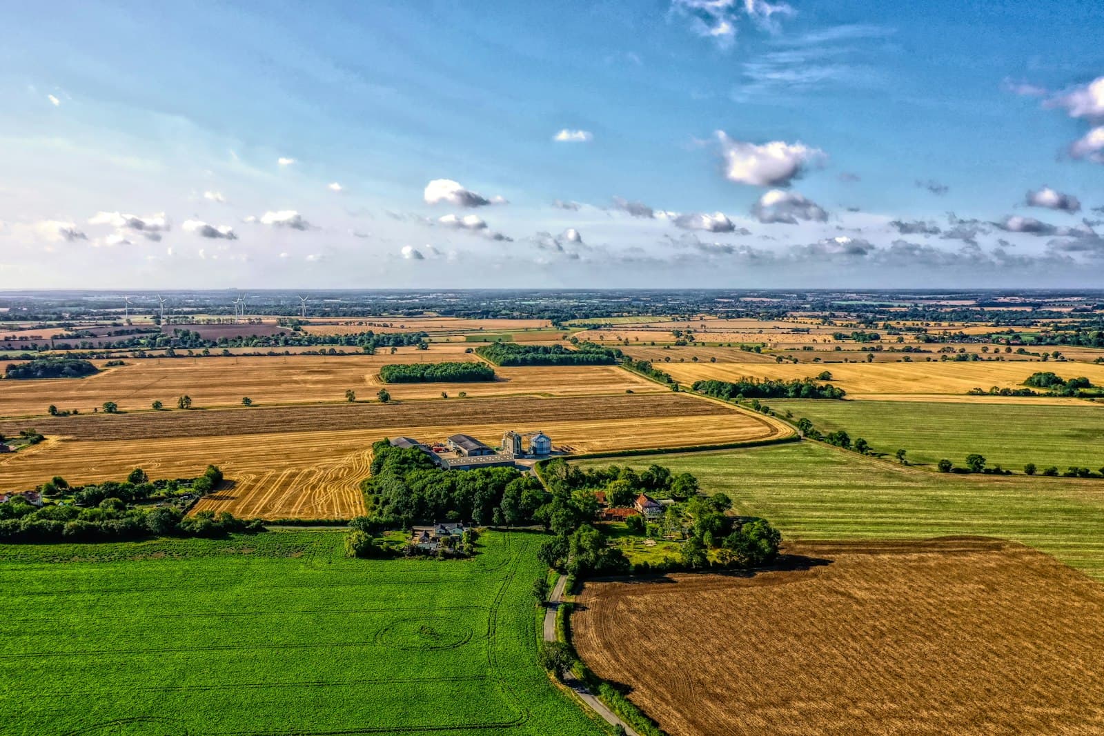 Aerial view of English farmland with a patchwork of fields